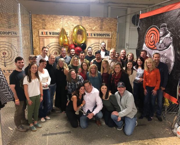 Group of People at Axe Throwing Event